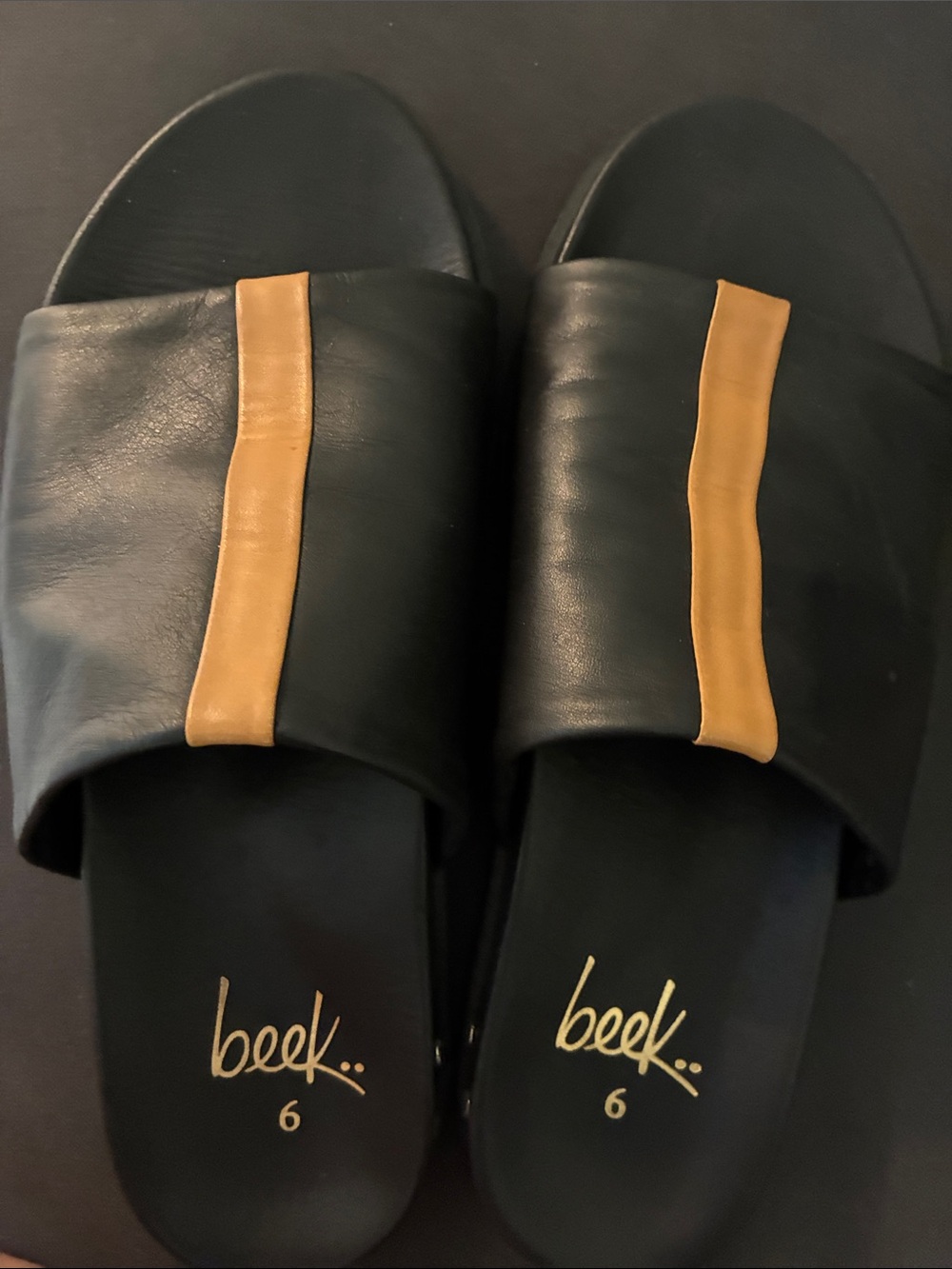 beek Black Slide Sandals with Tan Stripe